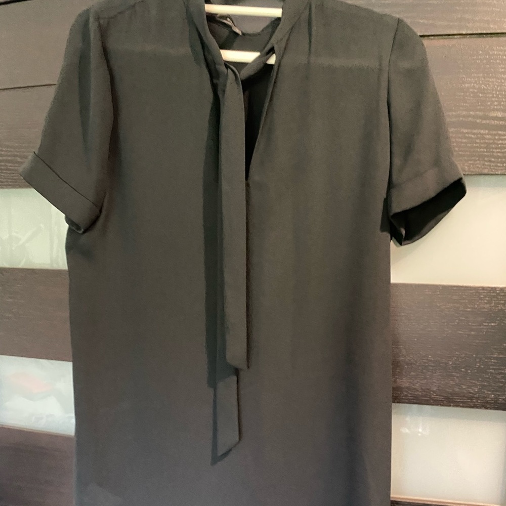 Little black dress. BCBG. Size Small. Worn once. Above knees. Loose.